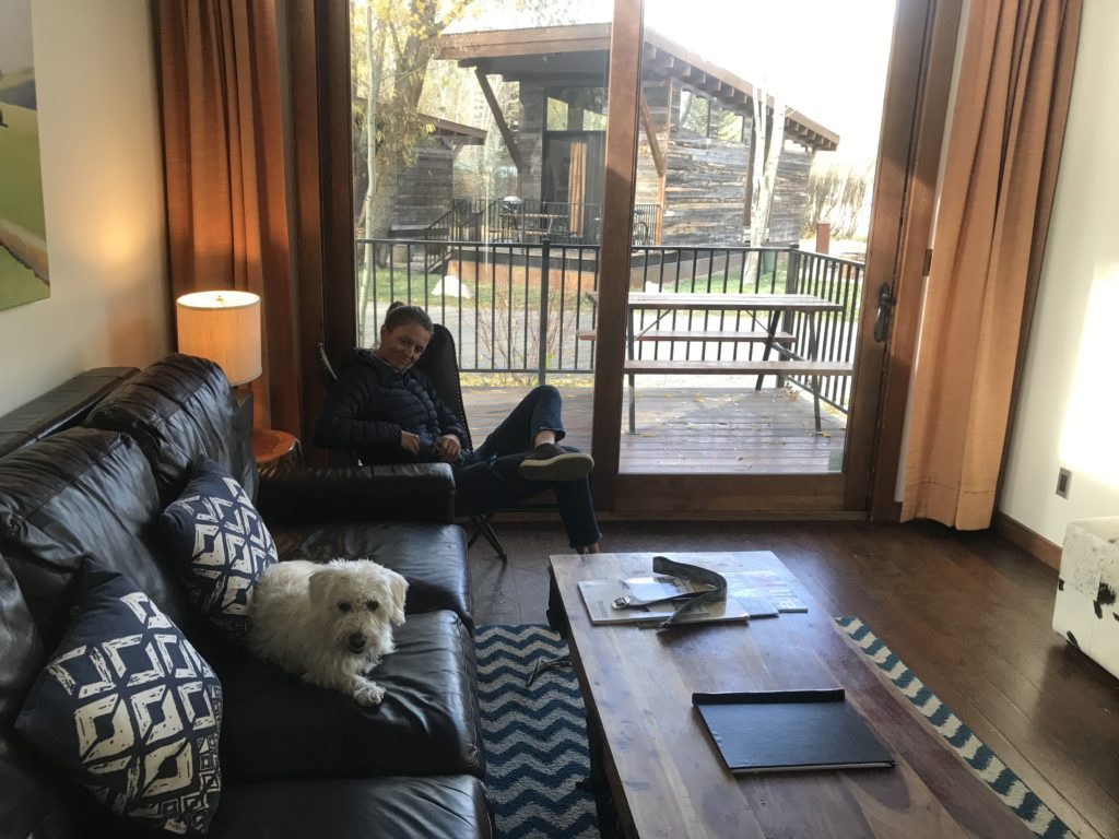A and dog in Fireside Resort cabin