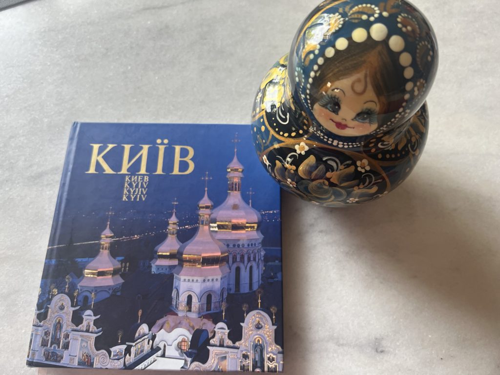 Book on Kyiv Ukraine and Matryoshka doll I brought from Ukraine