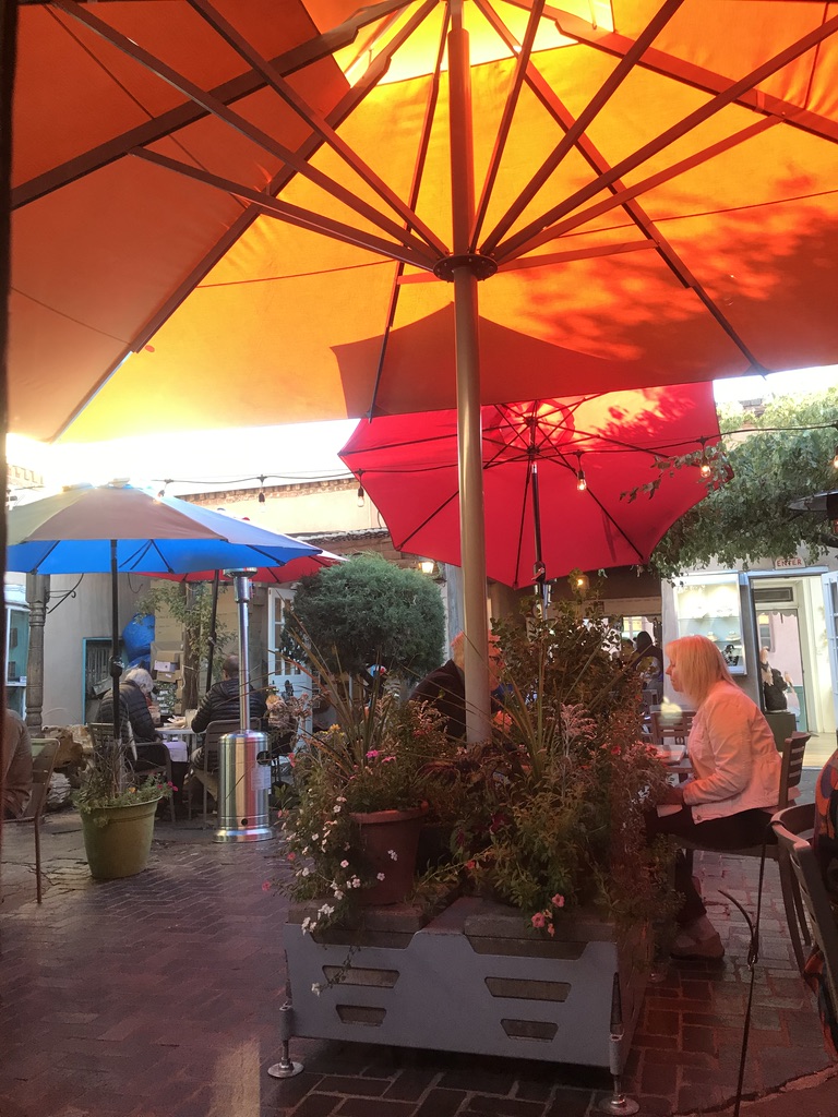 Colorful umbrella patio at The Shed, Santa Fe NM