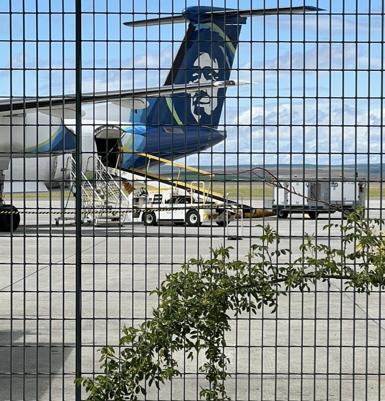 Alaska airlines unloading baggage
