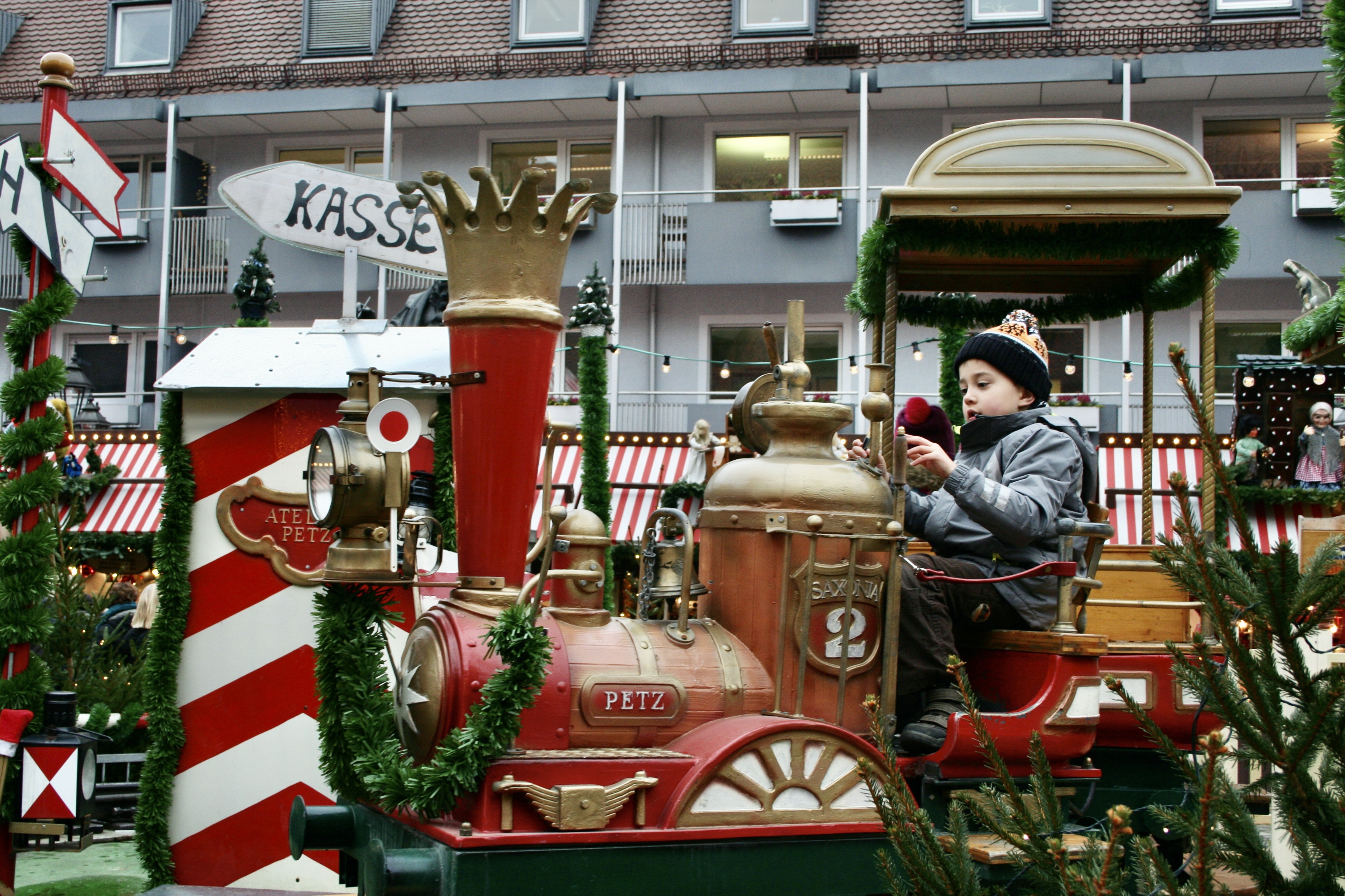 boy on train in German Christmas Market